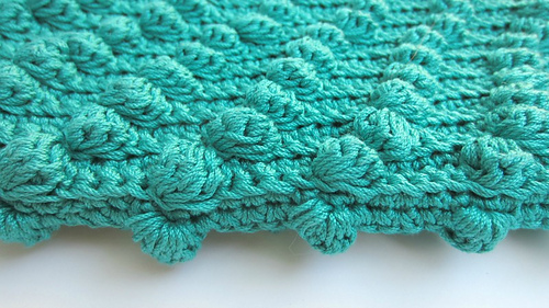 Diagonal_bobbles_clutch_bobble_detail_medium
