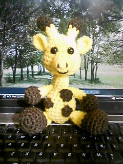 Babygiraffesitting_small2