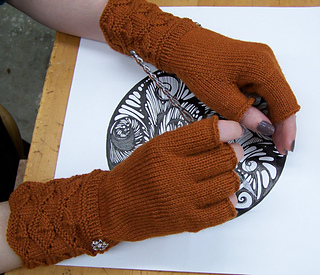Ravelry: Masala Fingerless Gloves pattern by Moira Engel