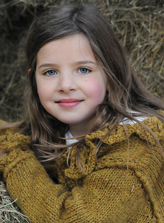 Corndolly_cardigan_portrait_shot_small2
