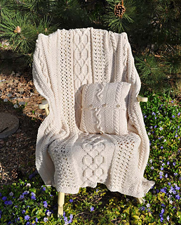 Fisherman_afghan_pillow_on_rocking_chair_outside_small2