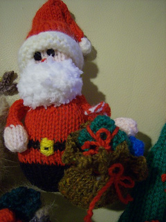 Stkgs_fthr_xmas_sack_small2